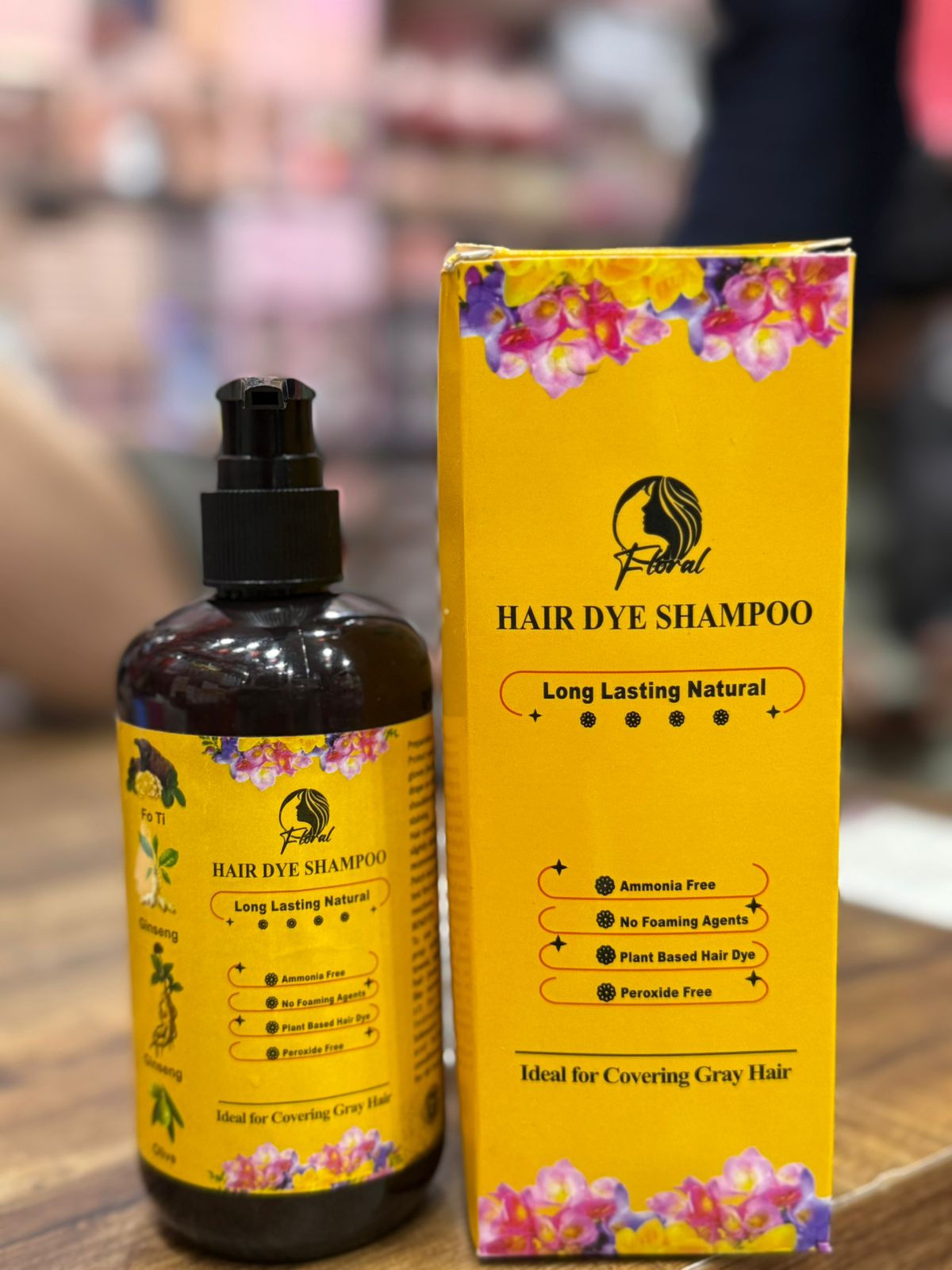 Floral hair dye shampoo by SS Smart Shop, cosmetics product with vibrant floral packaging, showcasing the shampoo bottle.